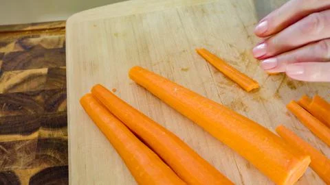 Cutting carrots Stock Photos