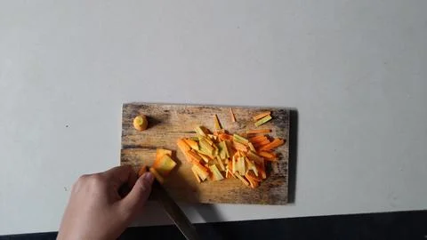 Cutting Carrots Foto stock