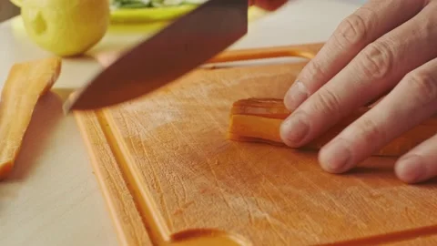 Cutting carrots into small cubes. Stock Footage 136651330