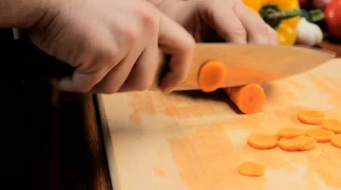Cutting carrots - tracking shot 스톡 동영상 12721351