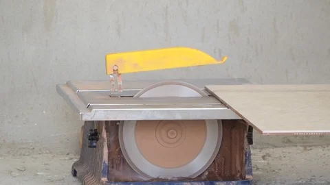Cutting ceramic floor tiles with a circular cutter. Stock Footage 111866061