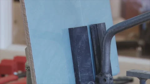 Cutting ceramic tiles Stock Footage 43129747