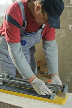 Cutting Ceramic Tiles. Stock Photos