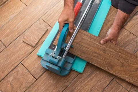 Cutting Ceramic Tiles. Stock-Fotos