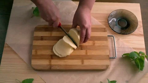 Cutting of cheese Stock Footage 69075419