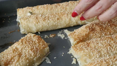 Cutting cheese pie on metal table Stock Footage 133605077