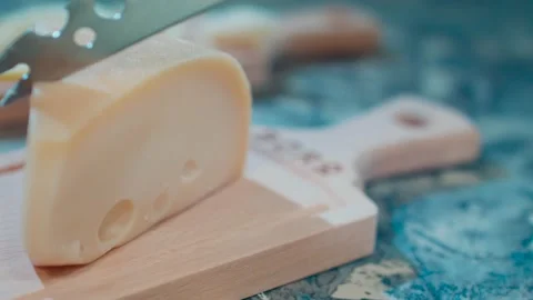 Cutting cheese very gently Stock-Footage 131422661
