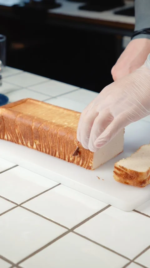 Cutting Cheesecake into Slices with Kitchen Knife Stock Footage 342924358