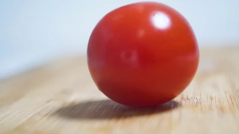 Cutting cherry tomato Stock Footage 97287927