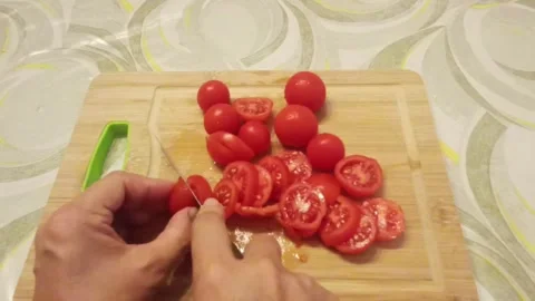 Cutting cherry tomato, Marina di Carrara, Italy, 01 September 2026 Stock Footage 344268502