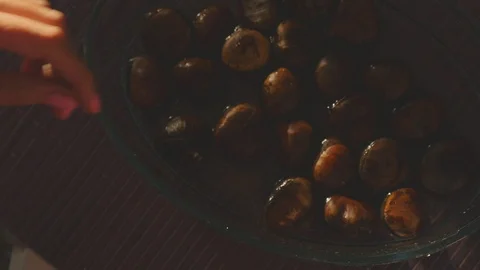 Cutting chestnuts with special scissors Stock Footage 106475985