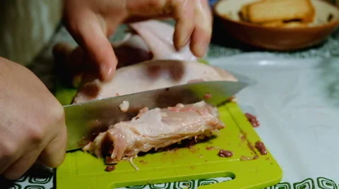 Cutting a chicken on a board Stock Footage 62993057