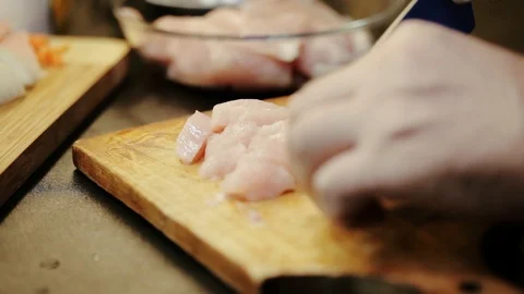 Cutting chicken breast Stock Footage 98361427