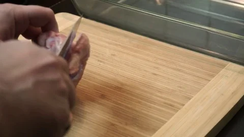 Cutting chicken wing Stock Footage 72960048