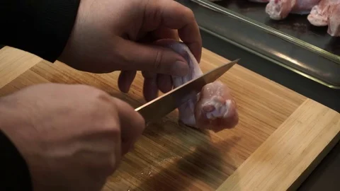 Cutting chicken wings Stock Footage 72960073