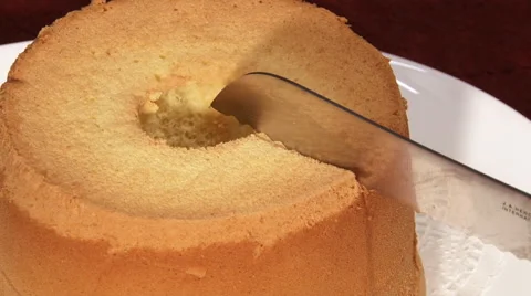 Cutting a chiffon cake Stock Footage 47579324