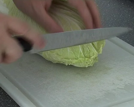 Cutting Chinese cabbage Stock Footage
