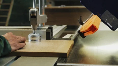 Cutting chipboard at 45 degrees on professional equipment Stock Footage 106726965
