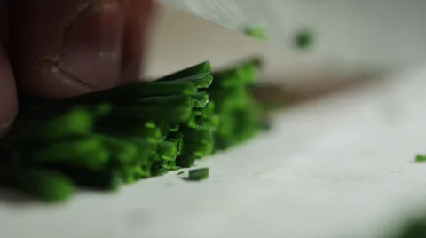 CUTTING CHIVES WITH KNIFE (SLOW MOTION) Stock Footage 29993461
