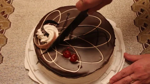 Cutting chocolate cake Stock Footage 135676598