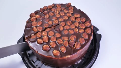 Cutting chocolate cake with a knife close-up Stock Footage 233489735