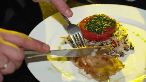 Cutting the chop into pieces 스톡 동영상 274873969