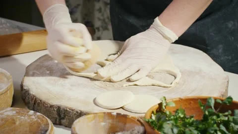 Cutting circles from the dough Stock Footage 138126824