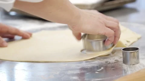 Cutting circles into the tortilla dough Stock Footage 307339959