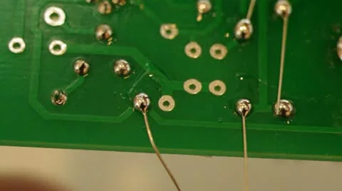 Cutting Circuit Board Leads Stock Footage