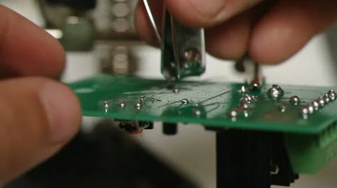 Cutting Circuit Board Leads II Stock Footage 11856038