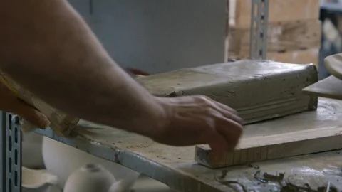 Cutting clay in blocks Stock Footage 87031575