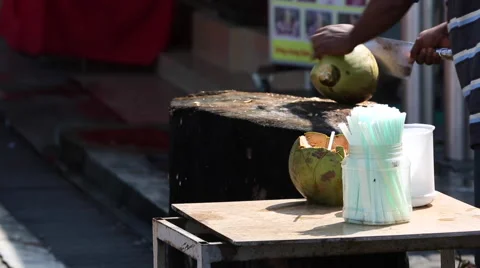 Cutting coconut in Malaysia Stock Footage 53832662