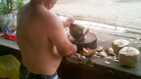 Cutting coconuts Stock Footage 11629721