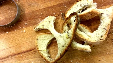 Cutting coctail slices of white bread, with a mold form, at a restaurant Stock Footage 57246187