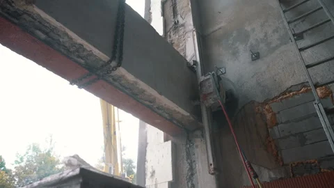 Cutting Concrete Wall Panel with Wall Saw. Construction and Demolition Work Stock Footage 288191440
