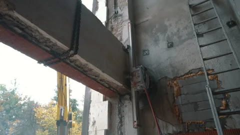 Cutting Concrete Wall Panel with Wall Saw. Construction and Demolition Work Stock Footage 288192037