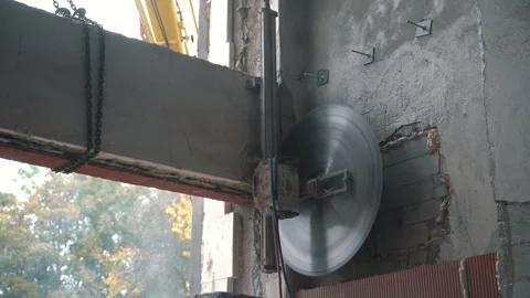 Cutting Concrete Wall Panel with Wall Saw. Construction and Demolition Work Stock Footage 288195176