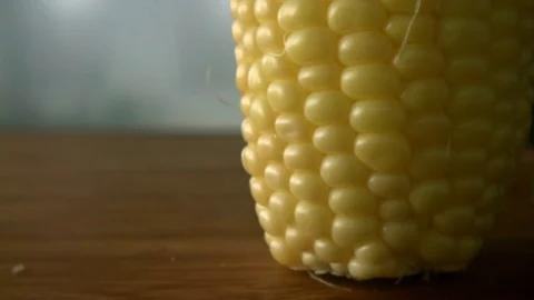 Cutting Corn Kernels Extreme Closeup Slowmotion Stock Footage 84058924