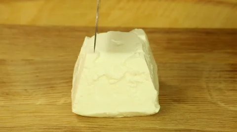 Cutting cream cheese Stock Footage 61879705