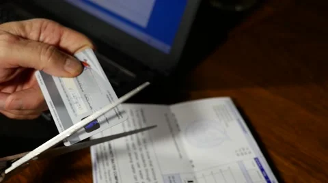 Cutting up a credit card Stock Footage 52698401