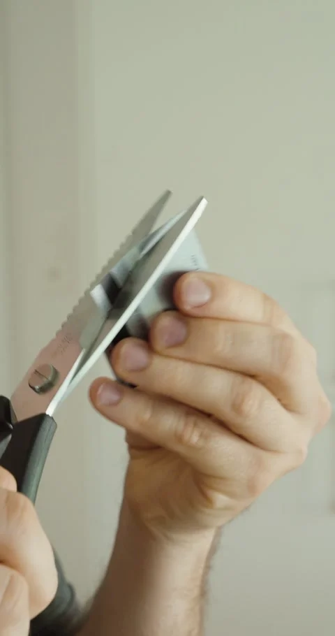 Cutting Credit Card with Scissors Close-Up Security Concept Stock Footage 334384003