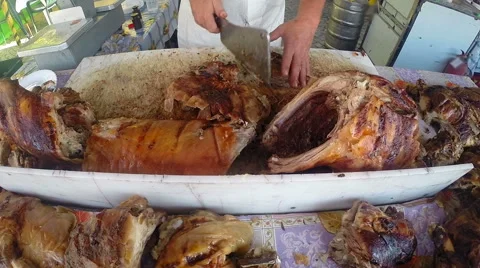 Cutting Crispy Roast Pig Stock Footage 67496047