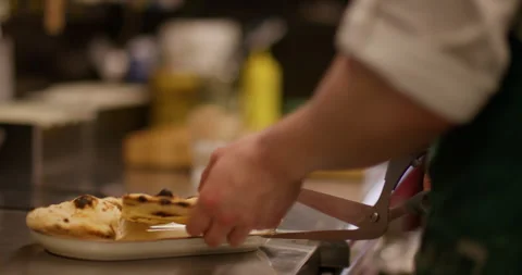 Cutting crunchy pita kitchen scissors baker piece Stock Footage 325188896