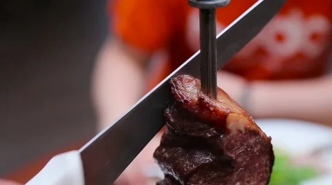 Cutting off the crust with barbecue Stock Footage 64829936