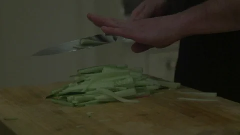 Cutting cucombers Stock Footage 99614998