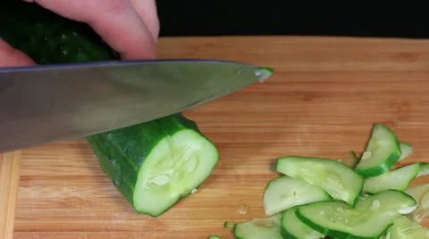 Cutting cucumber Stock Footage 10838459