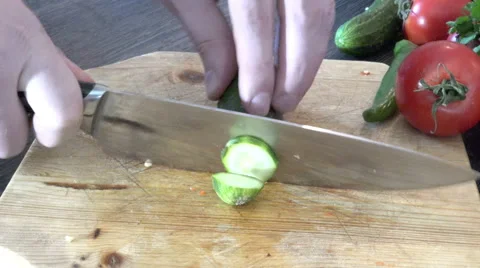 Cutting a cucumber Stock Footage 48137431