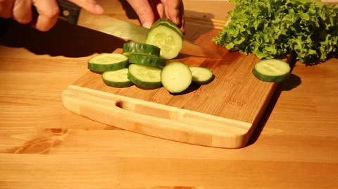 Cutting a cucumber Stock Footage 49998145
