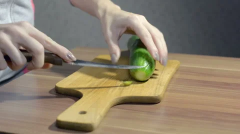 Cutting a cucumber Stock Footage 56139769