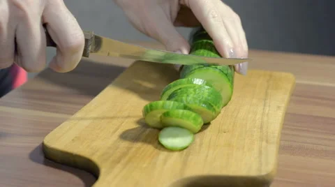 Cutting a cucumber Stock Footage 56140243